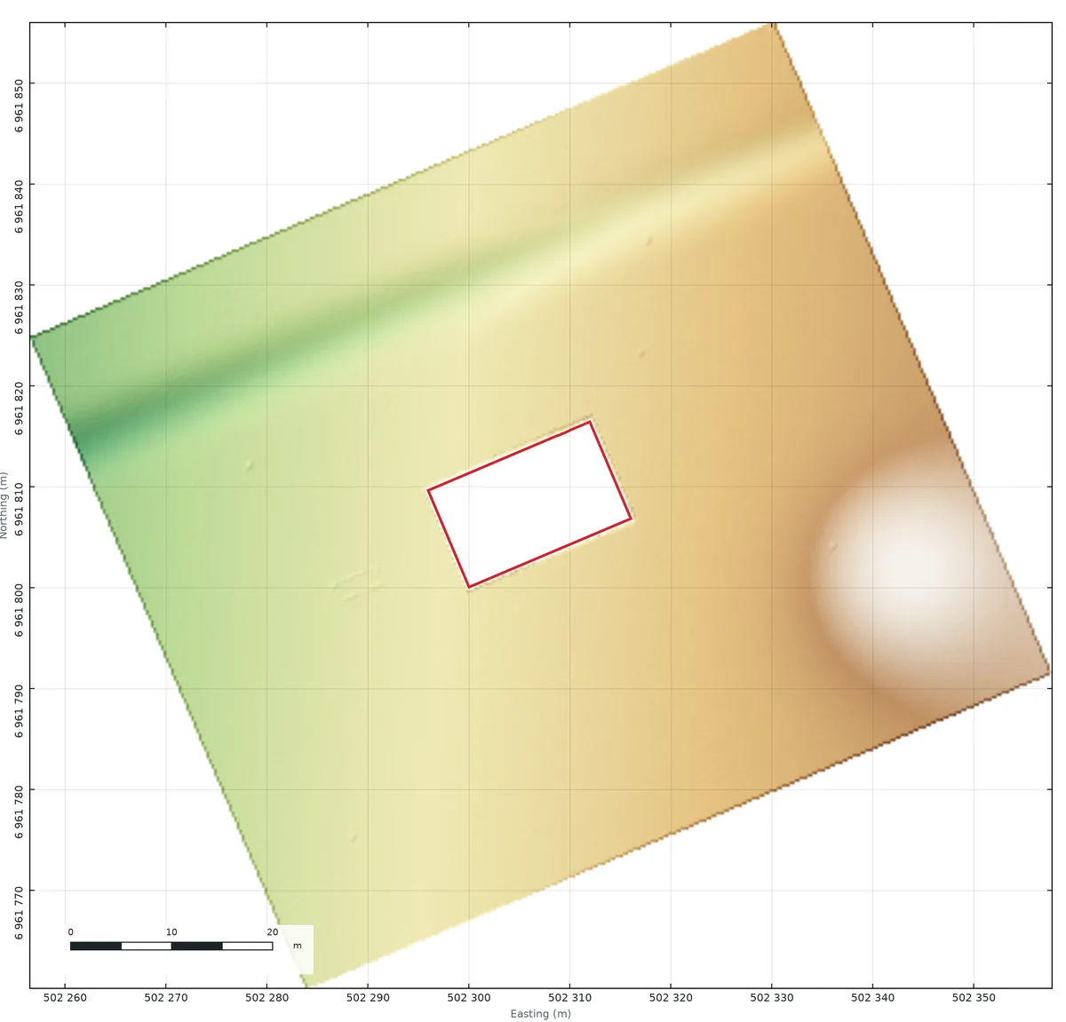 Shaded relief map of the ground around a house with the building outline